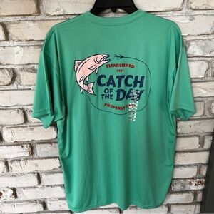Properly Tied green men shirt with graphic of hooked fish. NWT